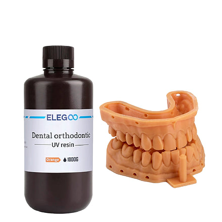 Bote de ELEGOO Dental Orthodontic naranja junto a un modelo dental impreso