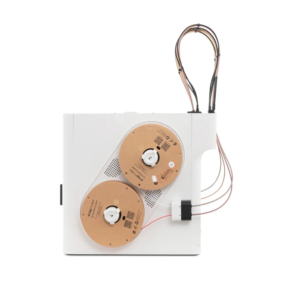 Lateral de la Snapmaker U1 con dos bobinas montadas y alimentador de filamento